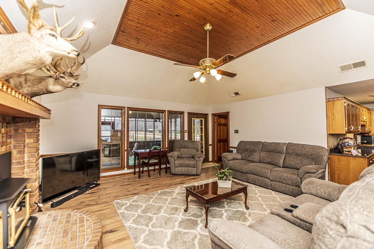 3899 Kerr Road Millington, TN 38053 - Photo 11 of 25 a living room with furniture ceiling fan and a rug
