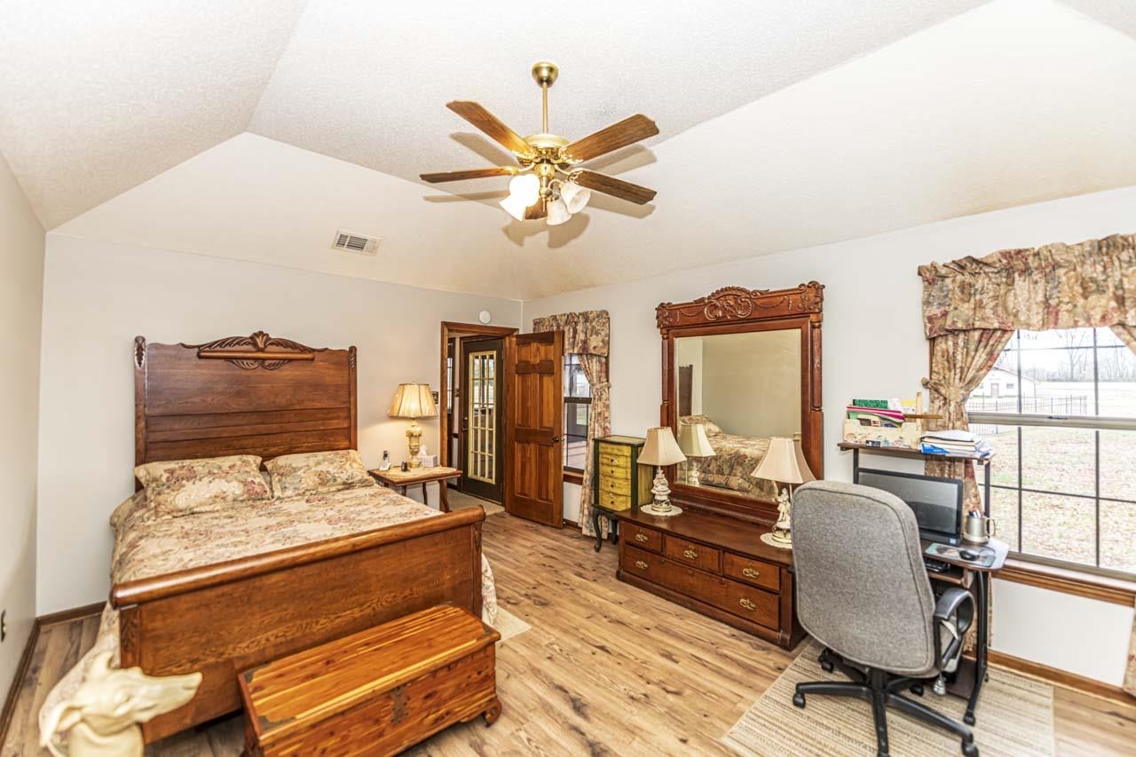3899 Kerr Road Millington, TN 38053 - Photo 15 of 25 a bedroom with furniture and a large window
