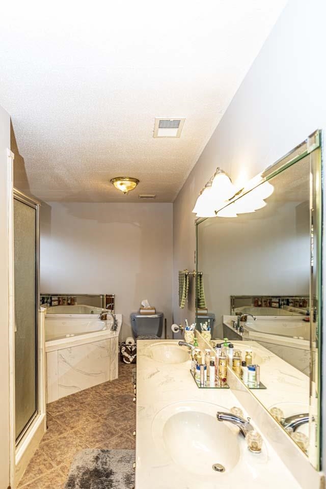 3899 Kerr Road Millington, TN 38053 - Photo 16 of 25 a bathroom with a sink double vanity and a mirror