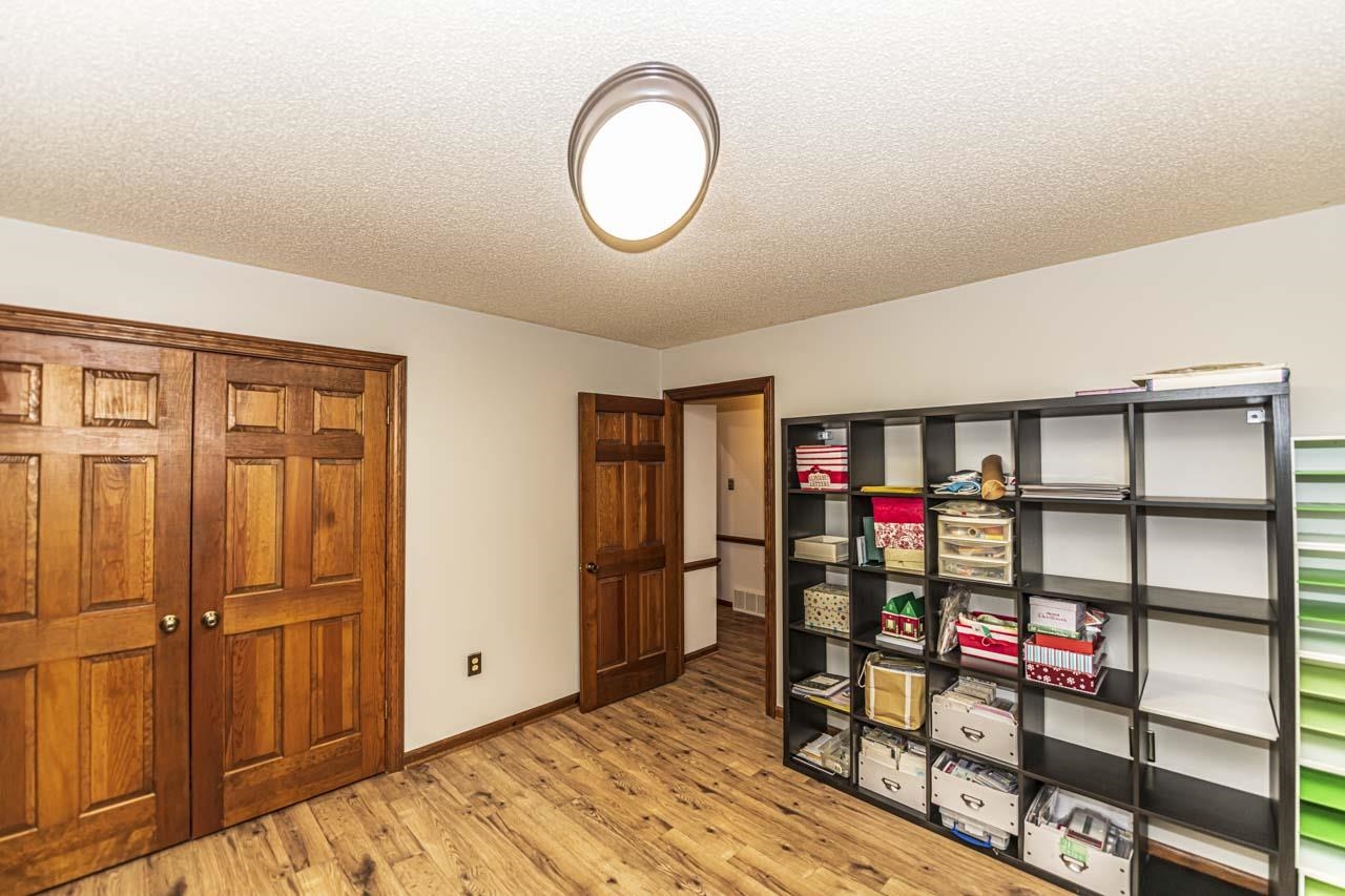 3899 Kerr Road Millington, TN 38053 - Photo 17 of 25 a view of a livingroom with shelves