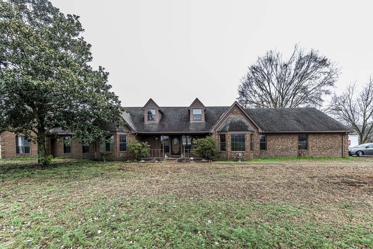 3899 Kerr Road Millington, TN 38053 - Photo 3 of 25 a front view of a house with a yard