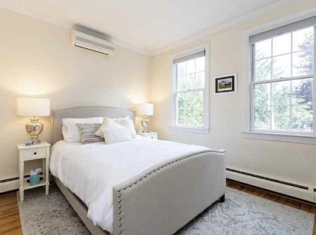 34 Austin Street, Unit 2 Boston, MA 02129 - Photo 16 of 19 a bedroom with a bed and a window