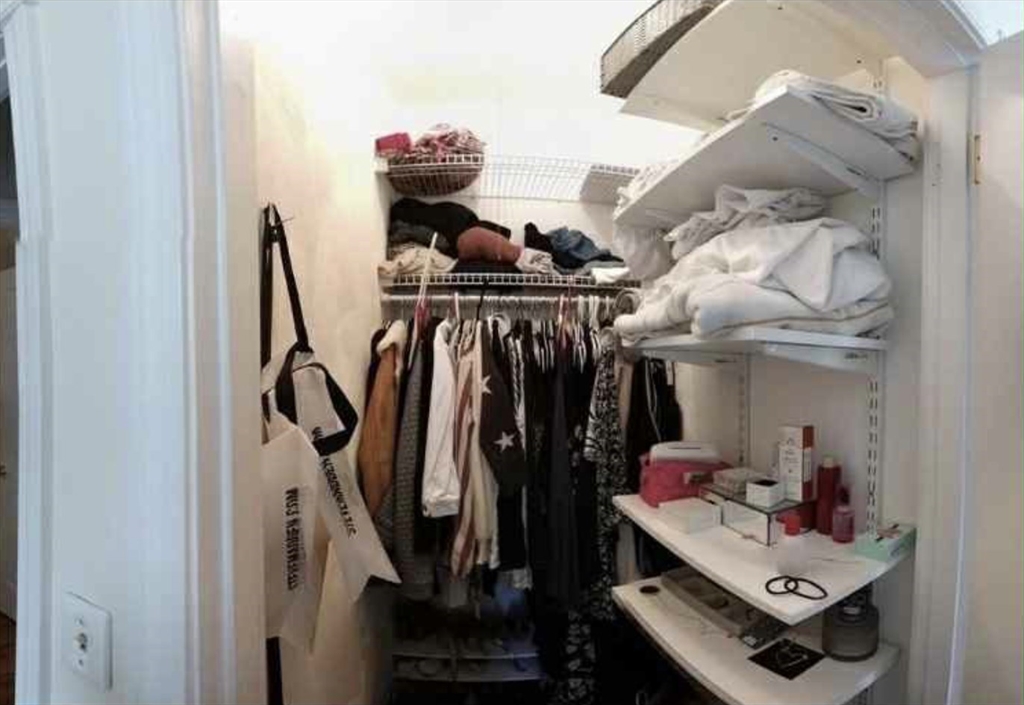 34 Austin Street, Unit 2 Boston, MA 02129 - Photo 17 of 19 a view of walk in closet with clothes and shoes