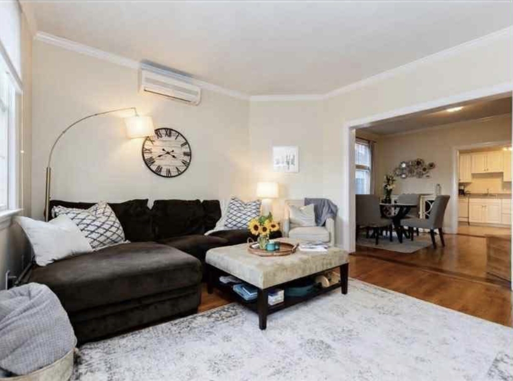 34 Austin Street, Unit 2 Boston, MA 02129 - Photo 6 of 19 a living room with furniture and wooden floor