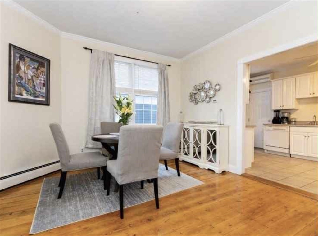 34 Austin Street, Unit 2 Boston, MA 02129 - Photo 8 of 19 a view of a livingroom with furniture window and wooden floor