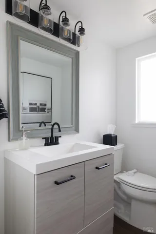 a bathroom with a sink and a toilet