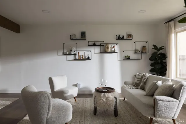 a living room with furniture and a couch