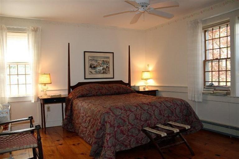 52 Cedar Land Road Orleans, MA 02653 - Photo 12 of 16 a bedroom with a bed and window
