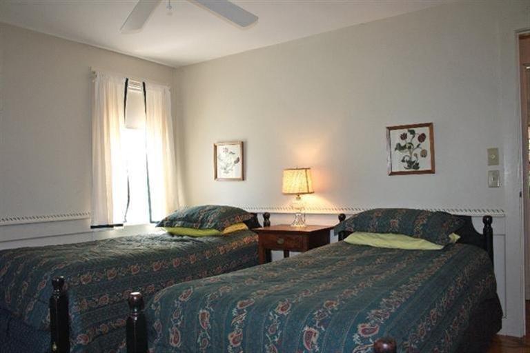 52 Cedar Land Road Orleans, MA 02653 - Photo 13 of 16 a bedroom with two beds and a window