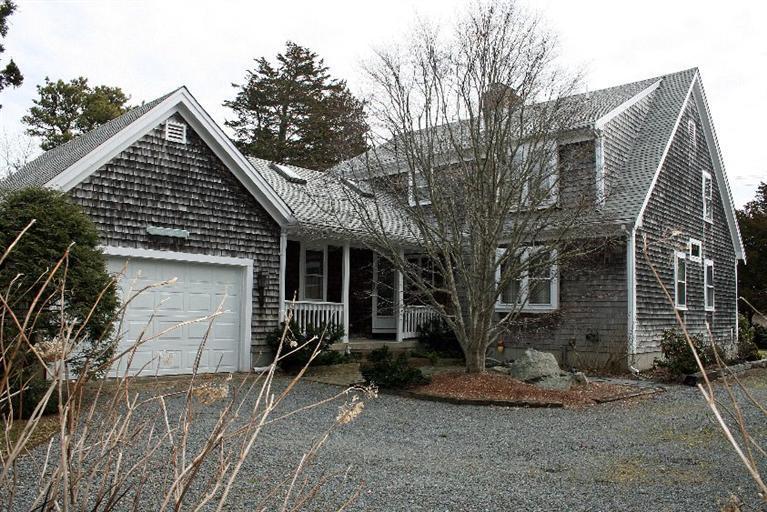 52 Cedar Land Road Orleans, MA 02653 - Photo 15 of 16 a view of house with a outdoor space