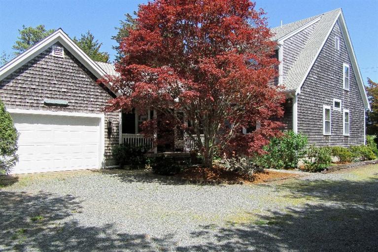 52 Cedar Land Road Orleans, MA 02653 - Photo 16 of 16 a view of a house with a yard