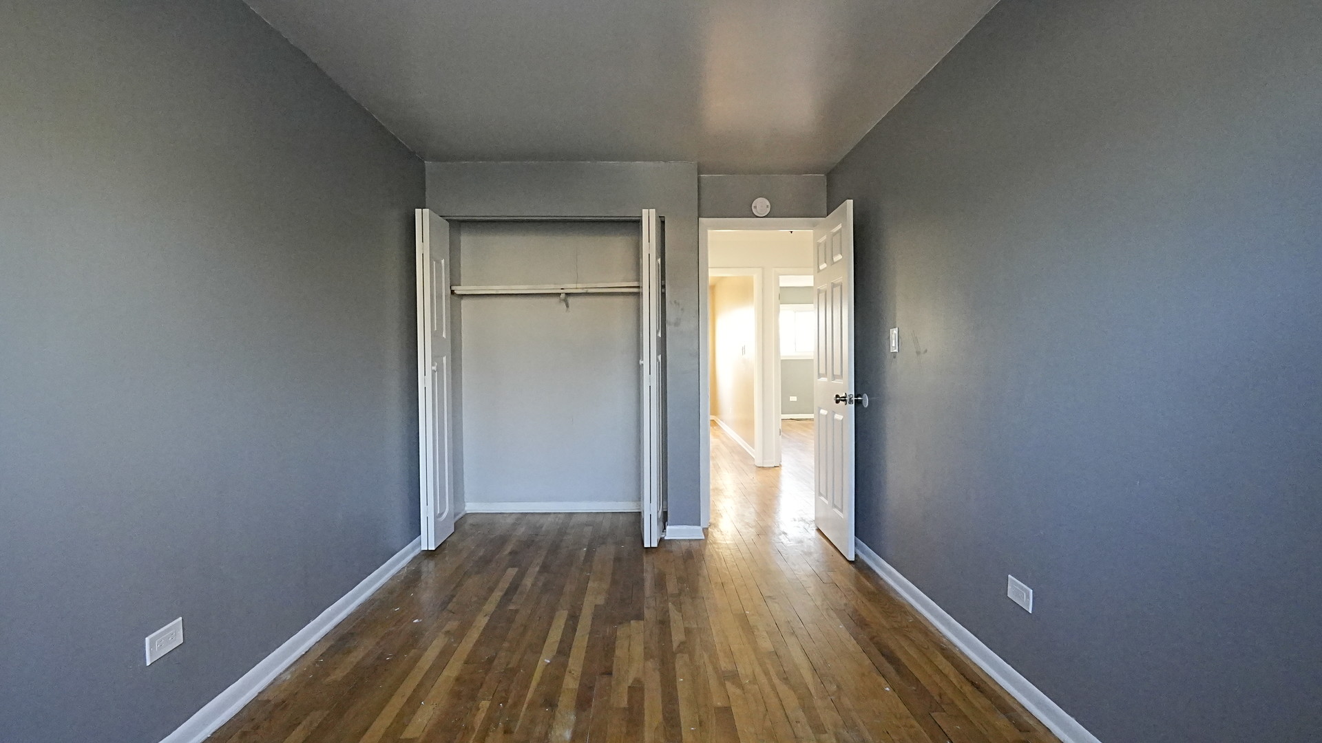 16918 Orchard Ridge Avenue Hazel Crest, IL 60429 - Photo 18 of 21 a view of a room with wooden floor and a window