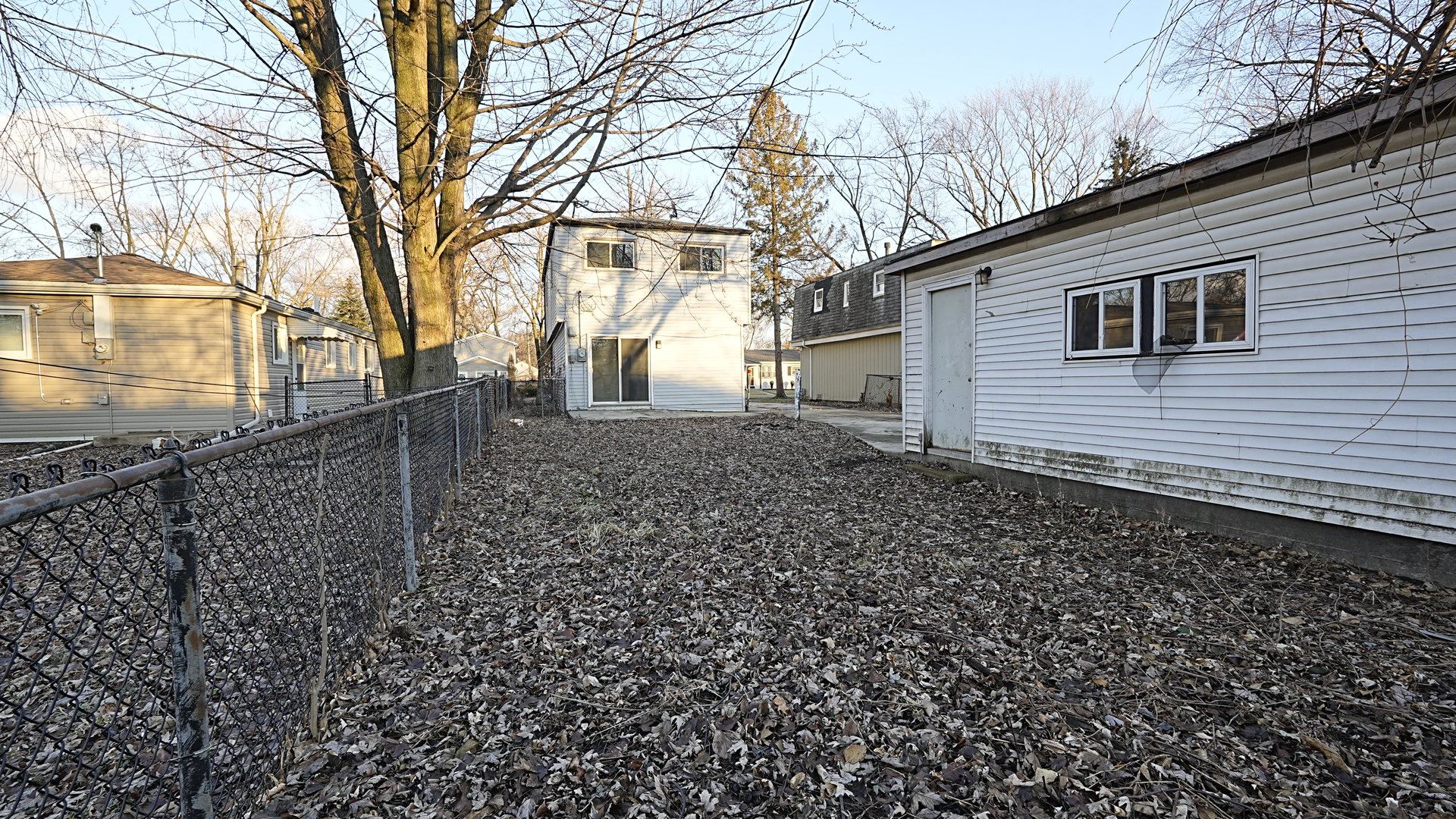 16918 Orchard Ridge Avenue Hazel Crest, IL 60429 - Photo 21 of 21 a backyard of a house with lots of green space