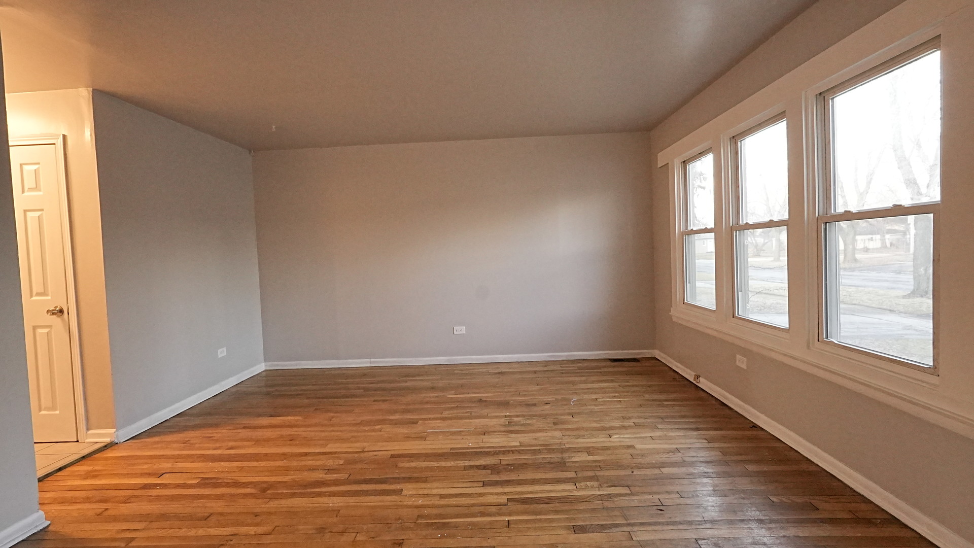 16918 Orchard Ridge Avenue Hazel Crest, IL 60429 - Photo 3 of 21 a view of an empty room with a window