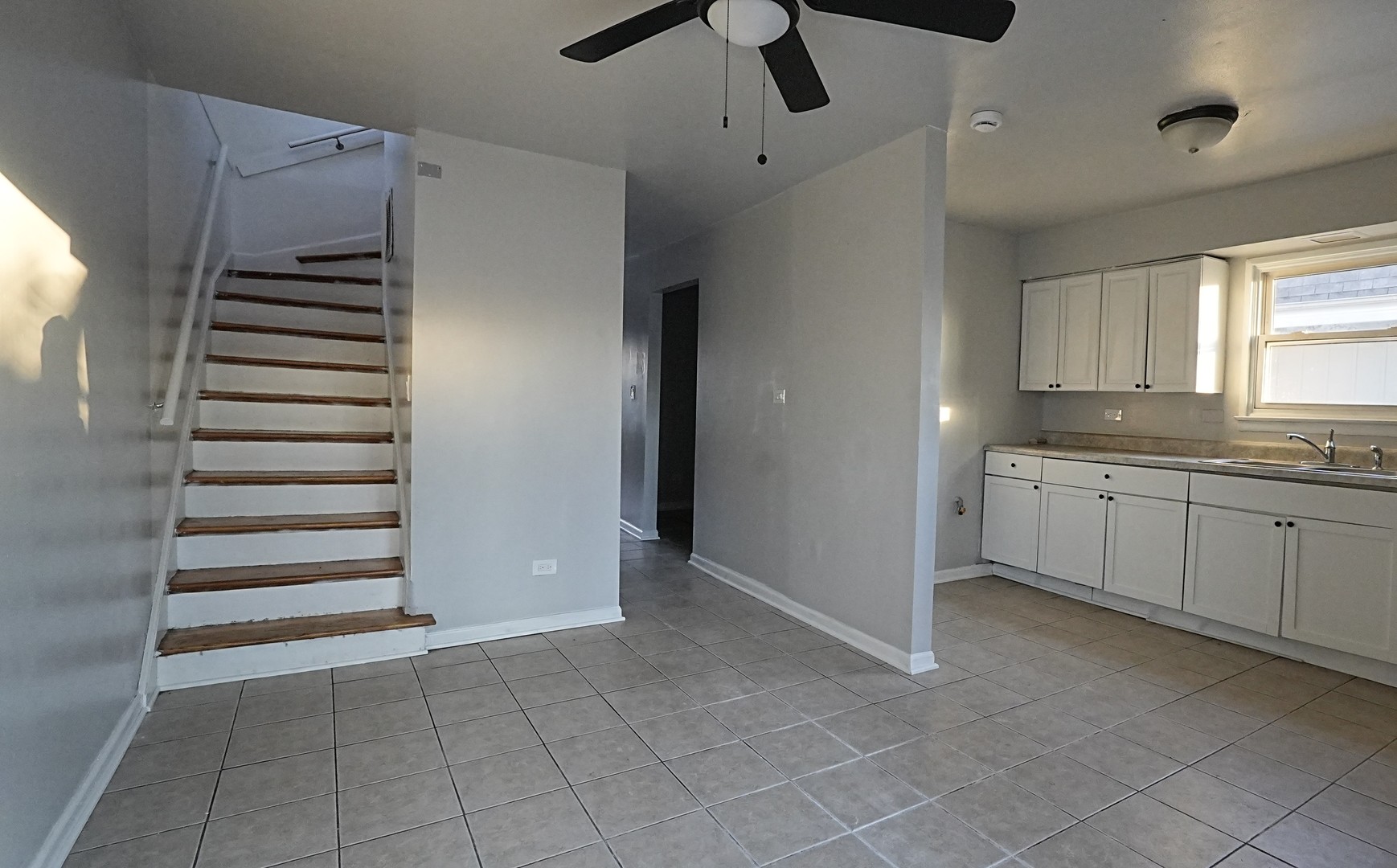 16918 Orchard Ridge Avenue Hazel Crest, IL 60429 - Photo 6 of 21 a view of cabinets and window