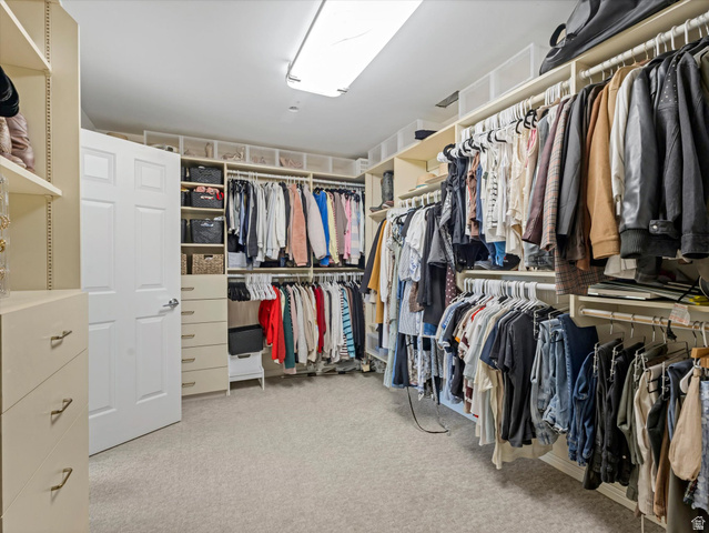 8318 Ridge Point Road Sandy, UT 84093 - Photo 25 of 46 Primary walk-in closet