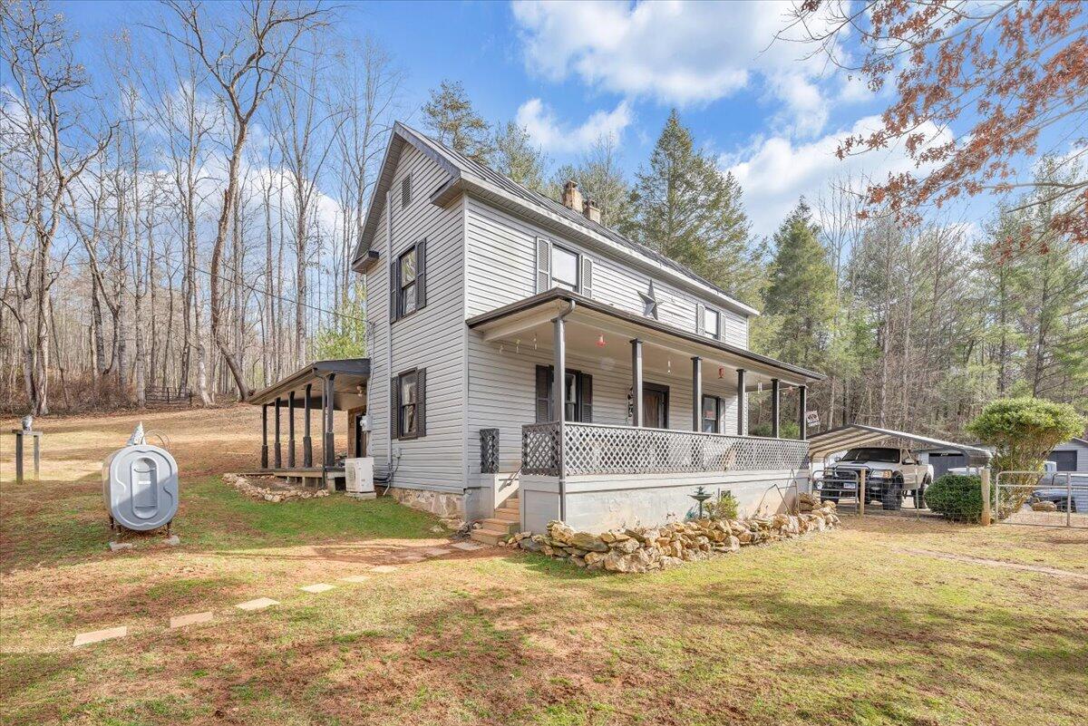 6702 Ferrum Mountain Road Callaway, VA 24067 - Photo 1 of 45 a front view of a house with yard