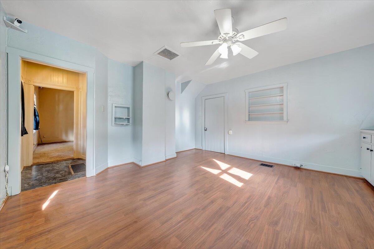 6702 Ferrum Mountain Road Callaway, VA 24067 - Photo 12 of 45 a view of empty room with wooden floor