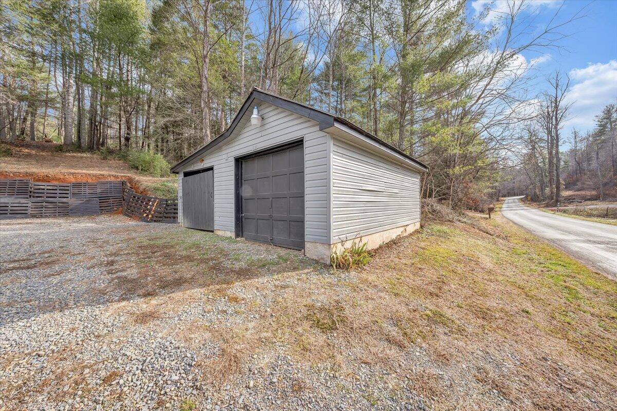 6702 Ferrum Mountain Road Callaway, VA 24067 - Photo 25 of 45 a view of garage yard and tree