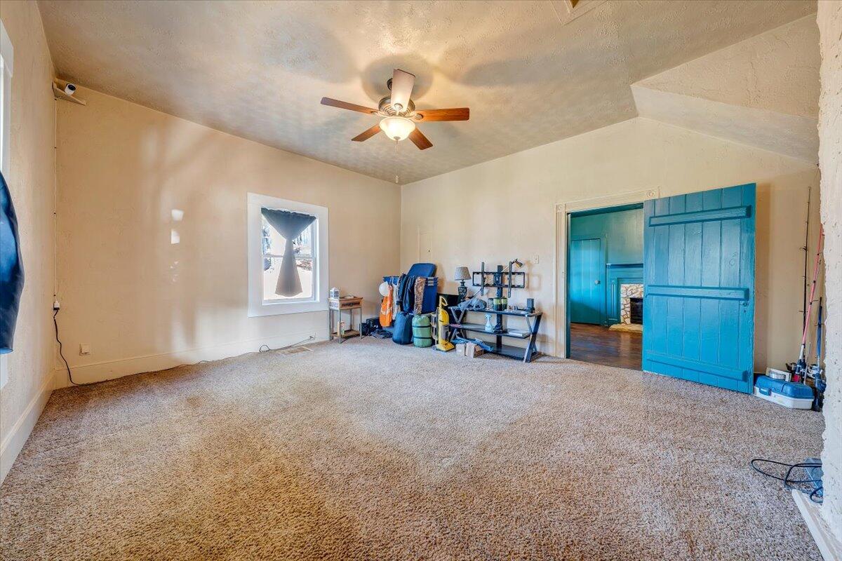 6702 Ferrum Mountain Road Callaway, VA 24067 - Photo 3 of 45 a view of a livingroom with a ceiling fan