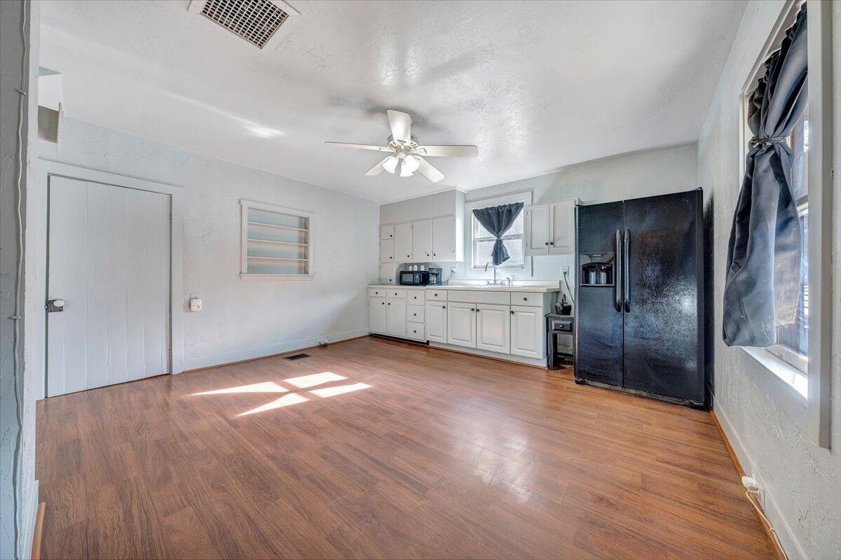 6702 Ferrum Mountain Road Callaway, VA 24067 - Photo 10 of 45 a view of a kitchen with a sink and cabinet area