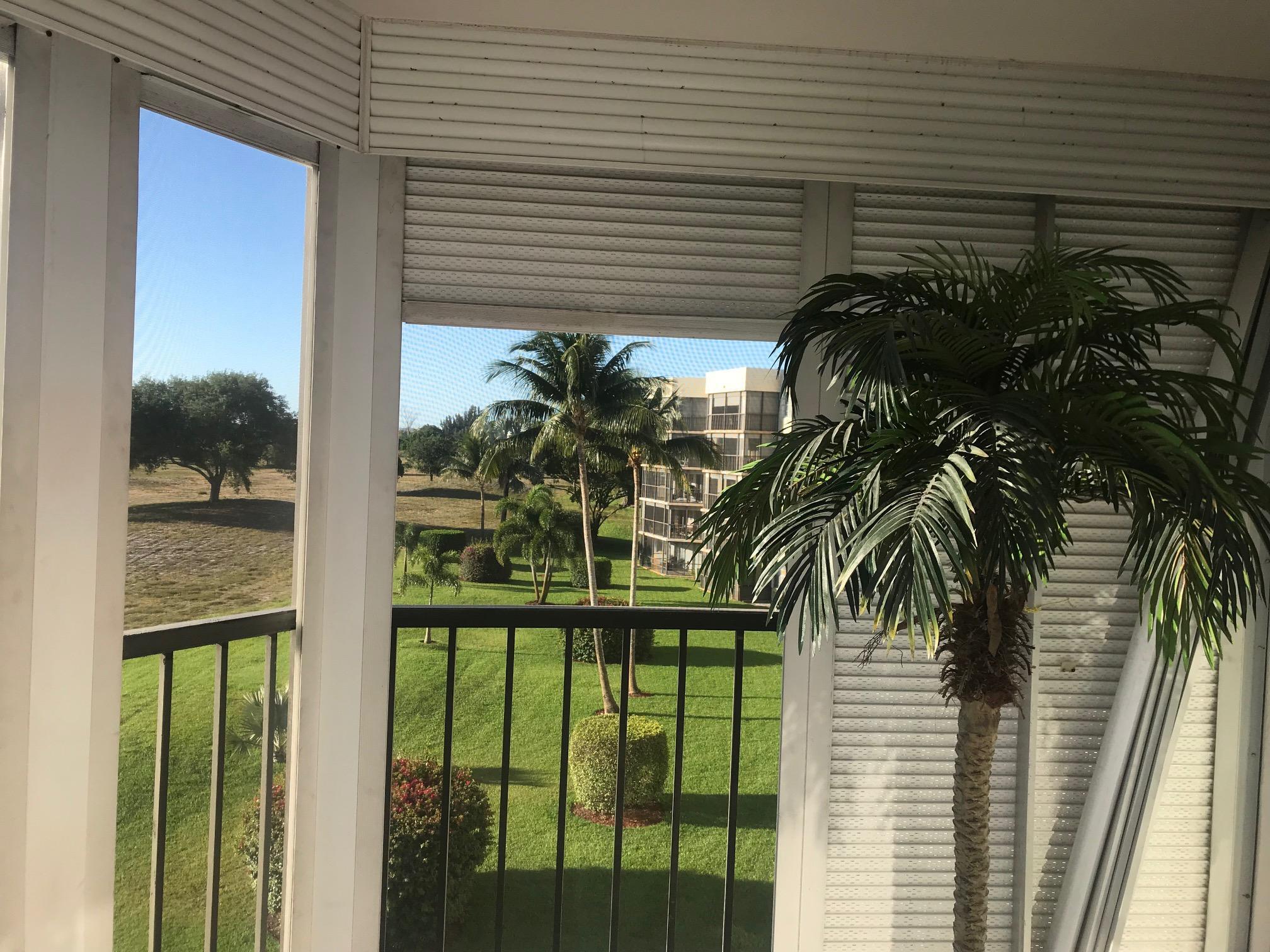 6400 Northwest 2nd Avenue, Unit 417 Boca Raton, FL 33487 - Photo 30 of 66 a view of balcony and yard