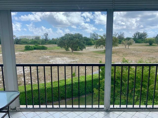 6400 Northwest 2nd Avenue, Unit 417 Boca Raton, FL 33487 - Photo 33 of 66 a view of a yard from a balcony