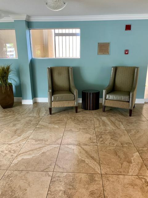 6400 Northwest 2nd Avenue, Unit 417 Boca Raton, FL 33487 - Photo 4 of 66 a living room with furniture and a window