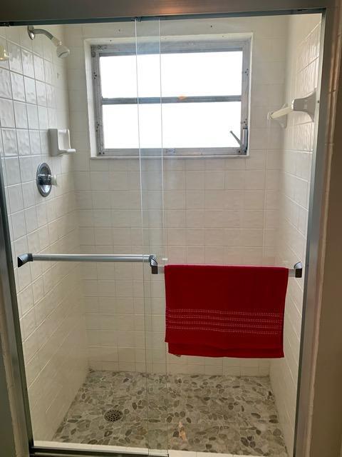 6400 Northwest 2nd Avenue, Unit 417 Boca Raton, FL 33487 - Photo 44 of 66 a bathroom with a shower