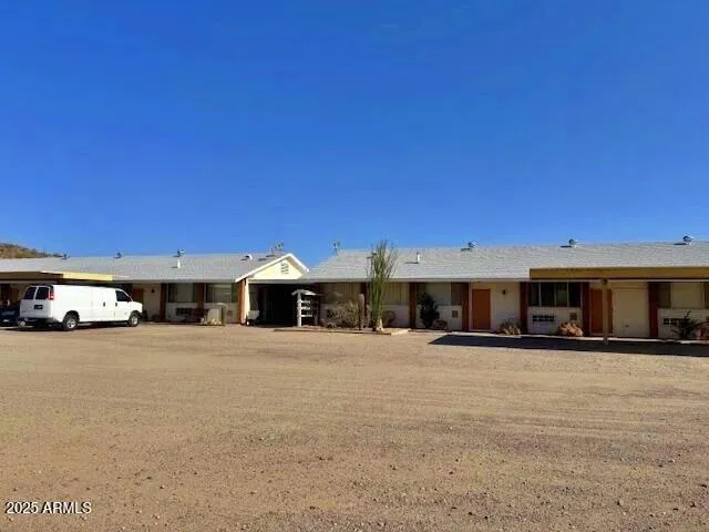 a view of a building with a large road