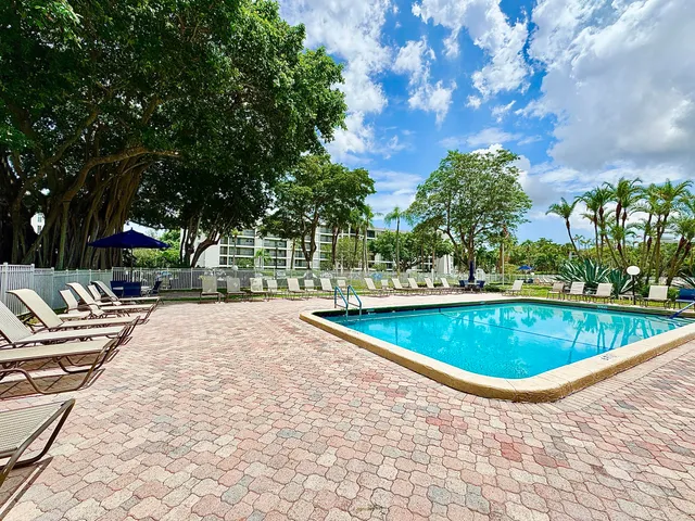 a view of outdoor space with swimming pool