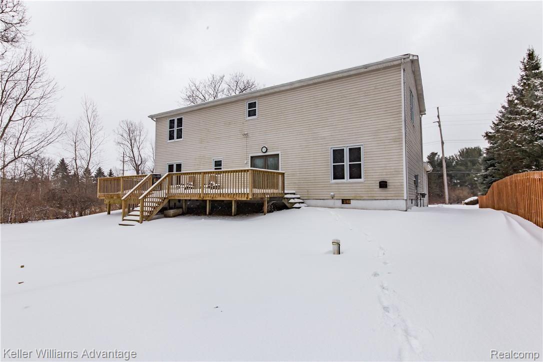 4180 East Commerce Road Commerce Township, MI 48382 - Photo 34 of 37 Commerce_4180_Back_05.jpg