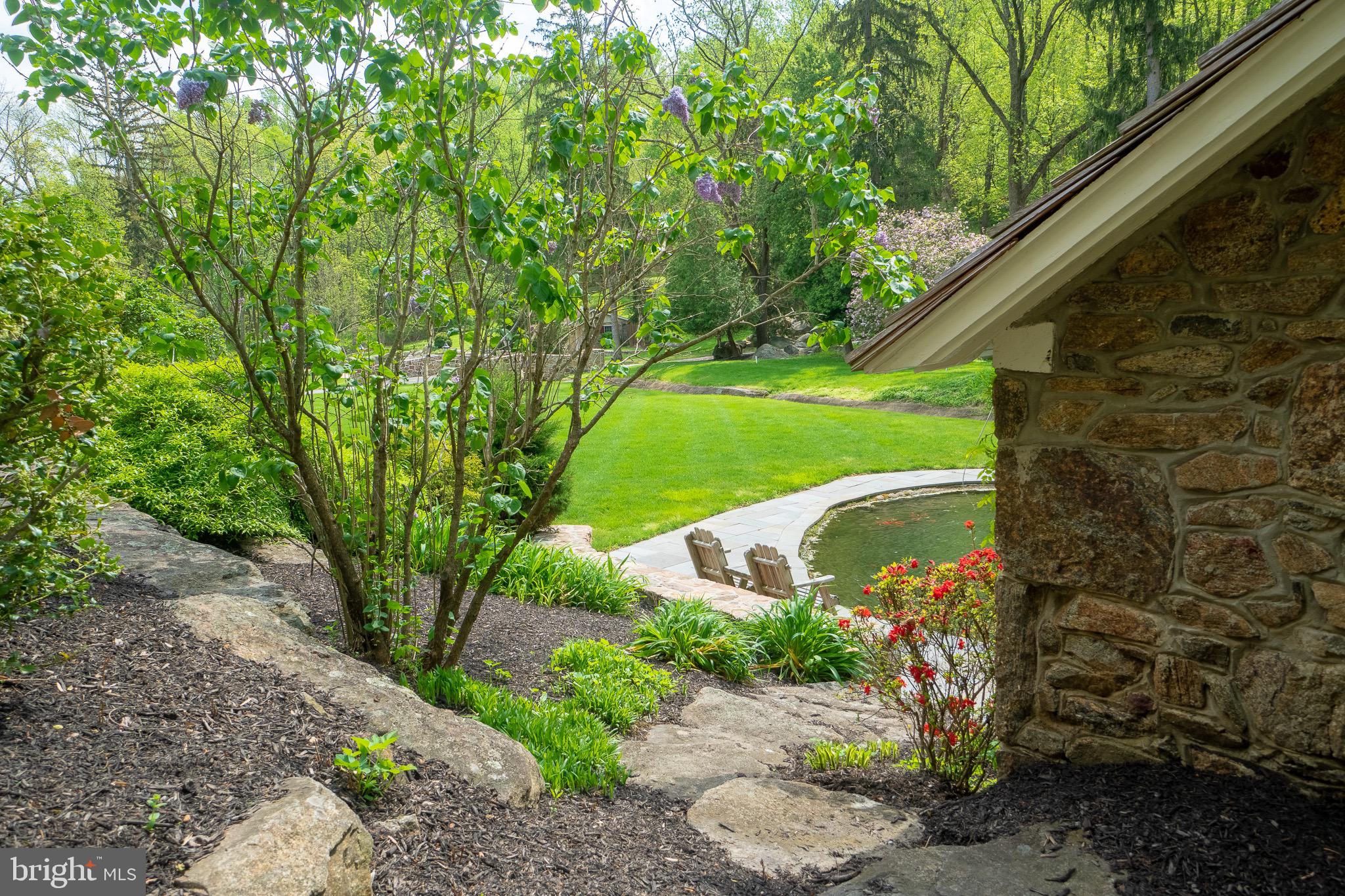635 Font Road Glenmoore, PA 19343 - Photo 25 of 29 View from side porch of the Koi pond