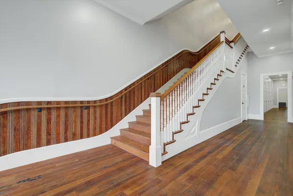 a view of entryway with wooden floor