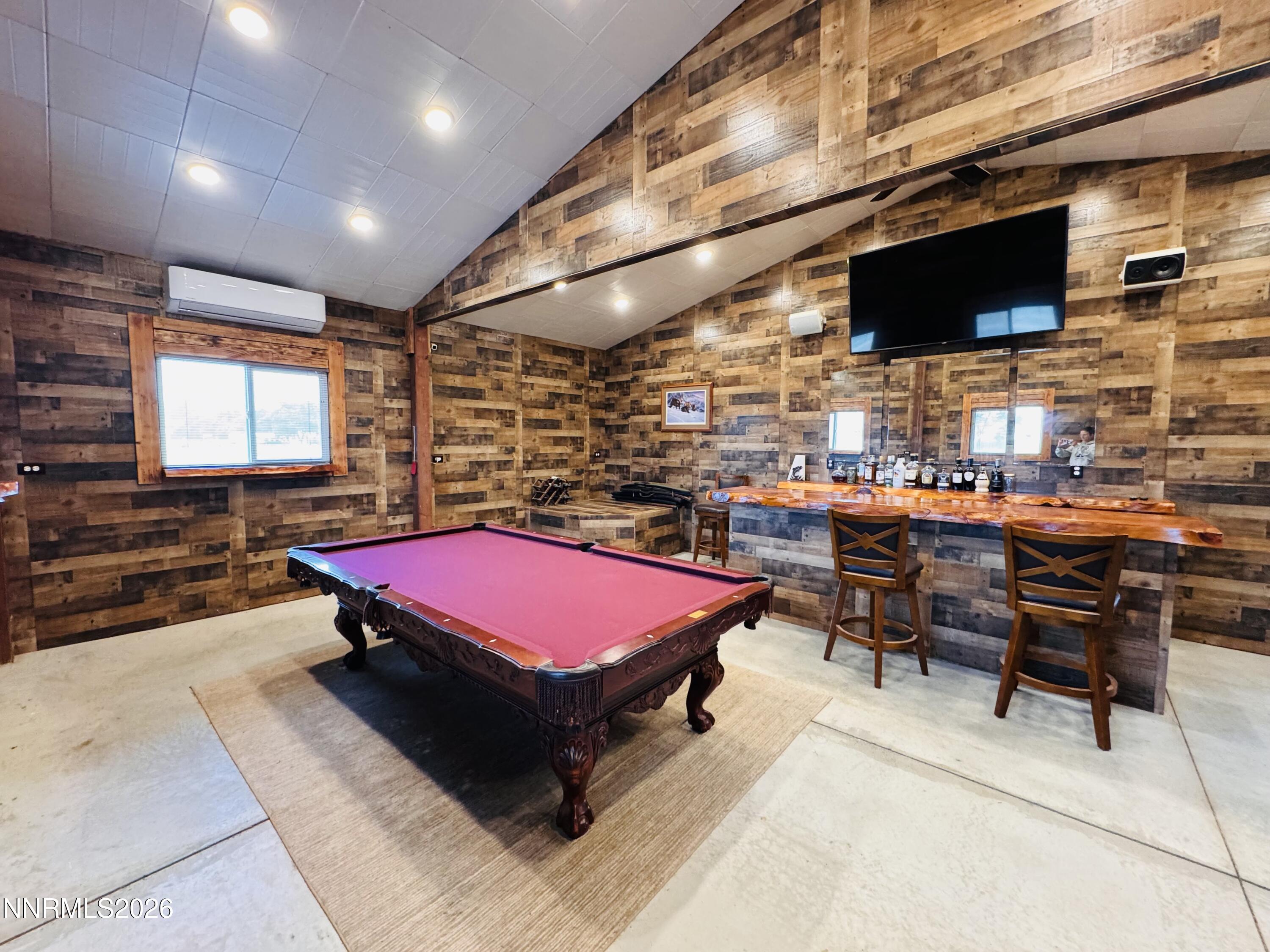 29400 Kings River Road Orovada, NV 89425 - Photo 34 of 40 a room with furniture pool table flat screen tv and windows