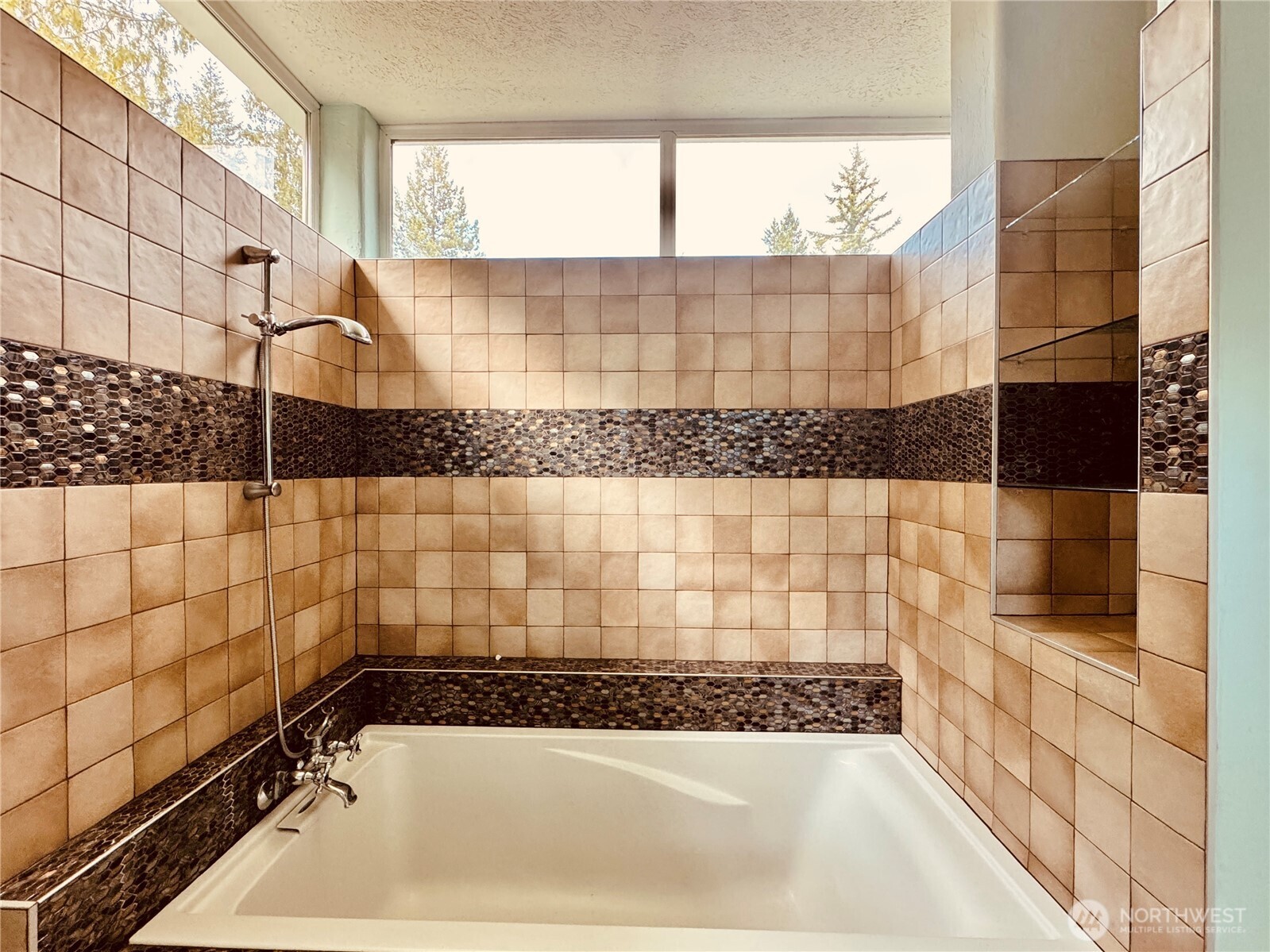 22305 Bald Hill Road Southeast Yelm, WA 98597 - Photo 11 of 39 a bathroom with a bathtub and shower