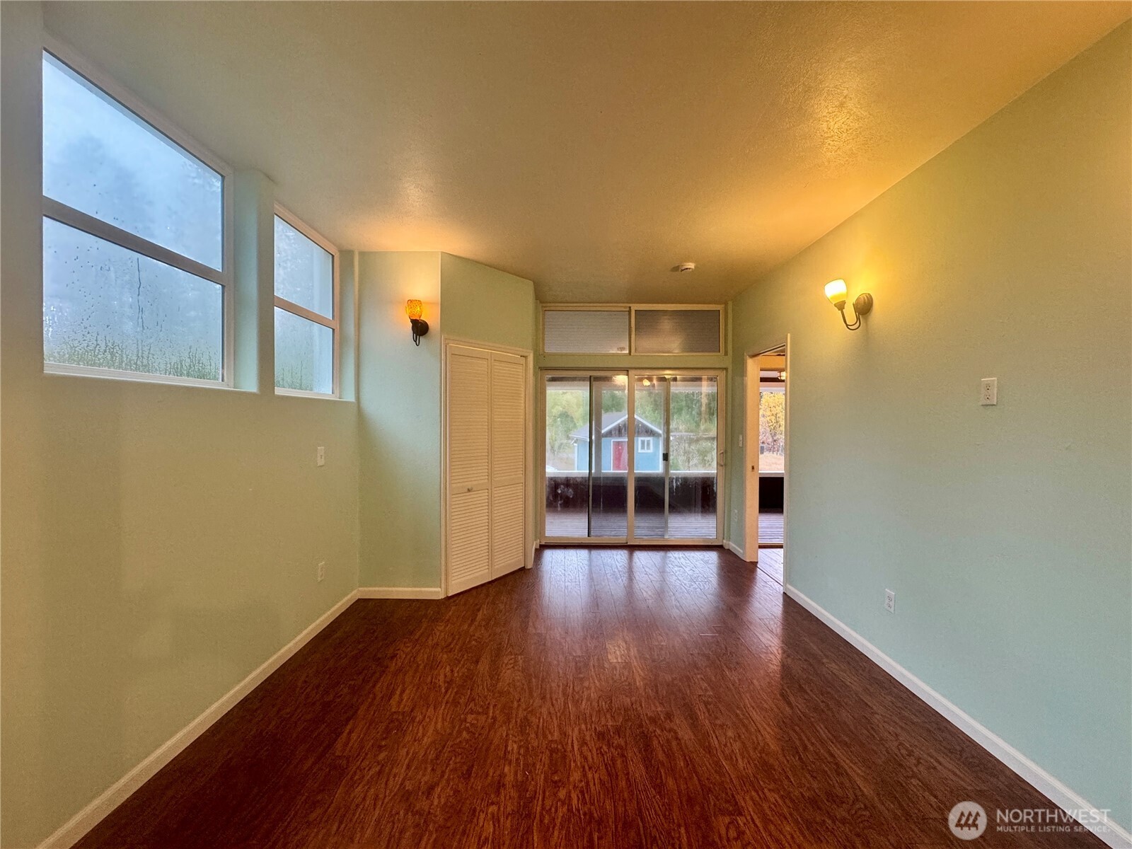 22305 Bald Hill Road Southeast Yelm, WA 98597 - Photo 14 of 39 a view of a hallway with wooden floor
