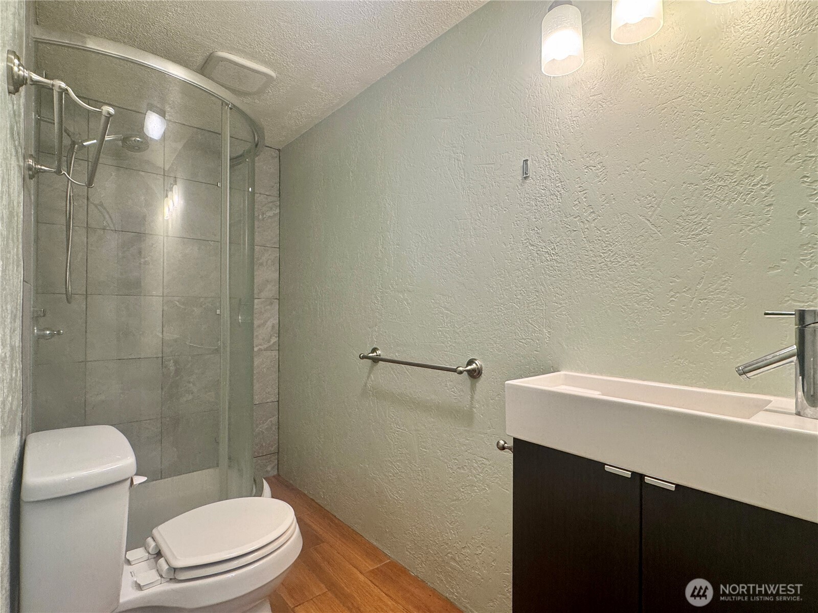 22305 Bald Hill Road Southeast Yelm, WA 98597 - Photo 23 of 39 a bathroom with a sink a toilet and shower