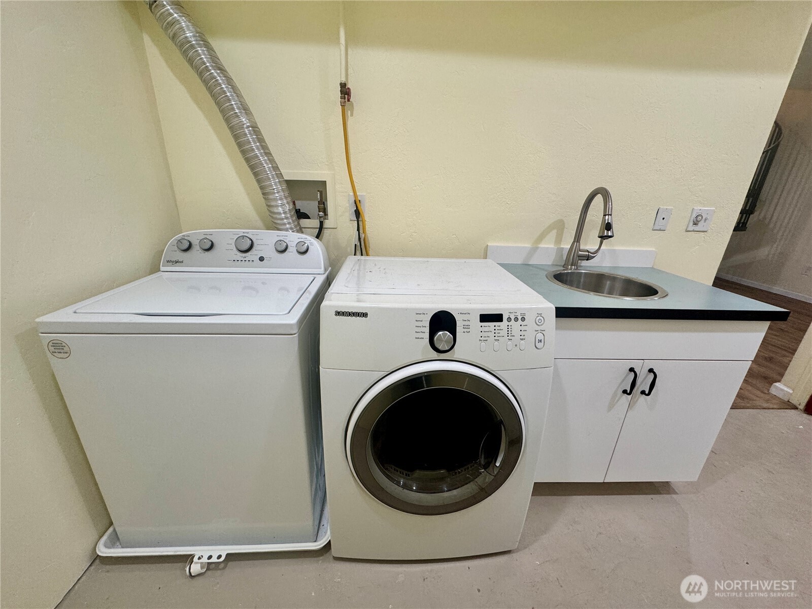 22305 Bald Hill Road Southeast Yelm, WA 98597 - Photo 25 of 39 a utility room with dryer and washer