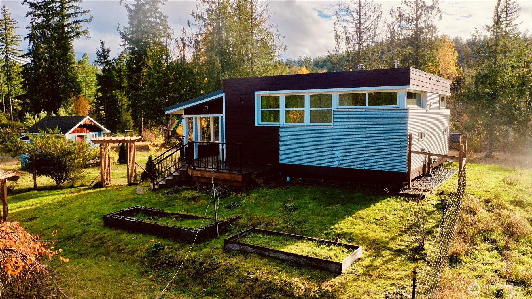22305 Bald Hill Road Southeast Yelm, WA 98597 - Photo 30 of 39 a view of backyard of house with green space