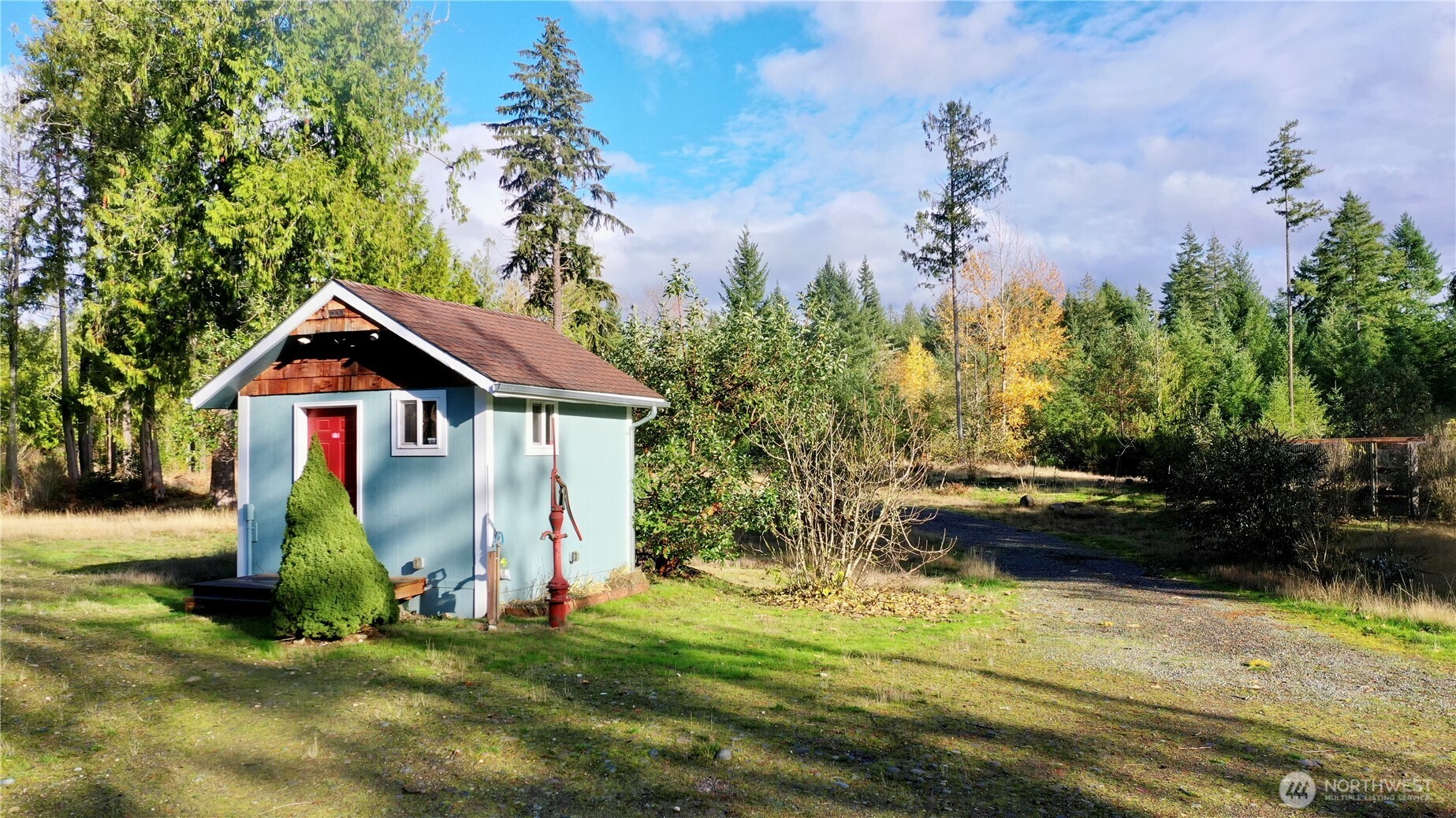 22305 Bald Hill Road Southeast Yelm, WA 98597 - Photo 32 of 39 a front view of a house with a yard