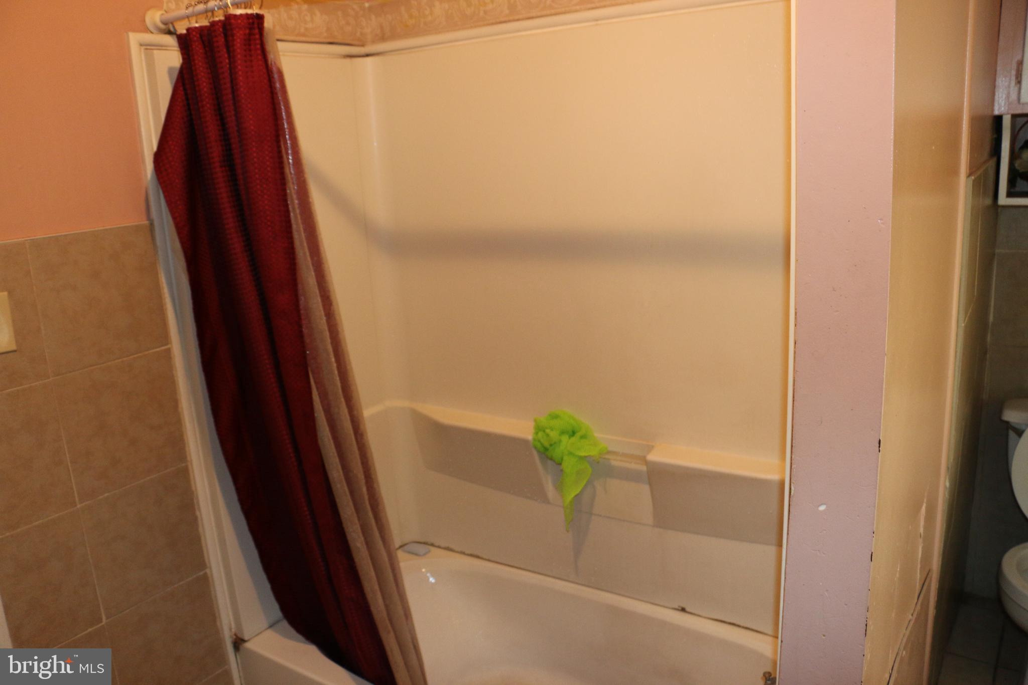 9 North Front Street Darby, PA 19023 - Photo 13 of 19 a view of a closet with wooden floor