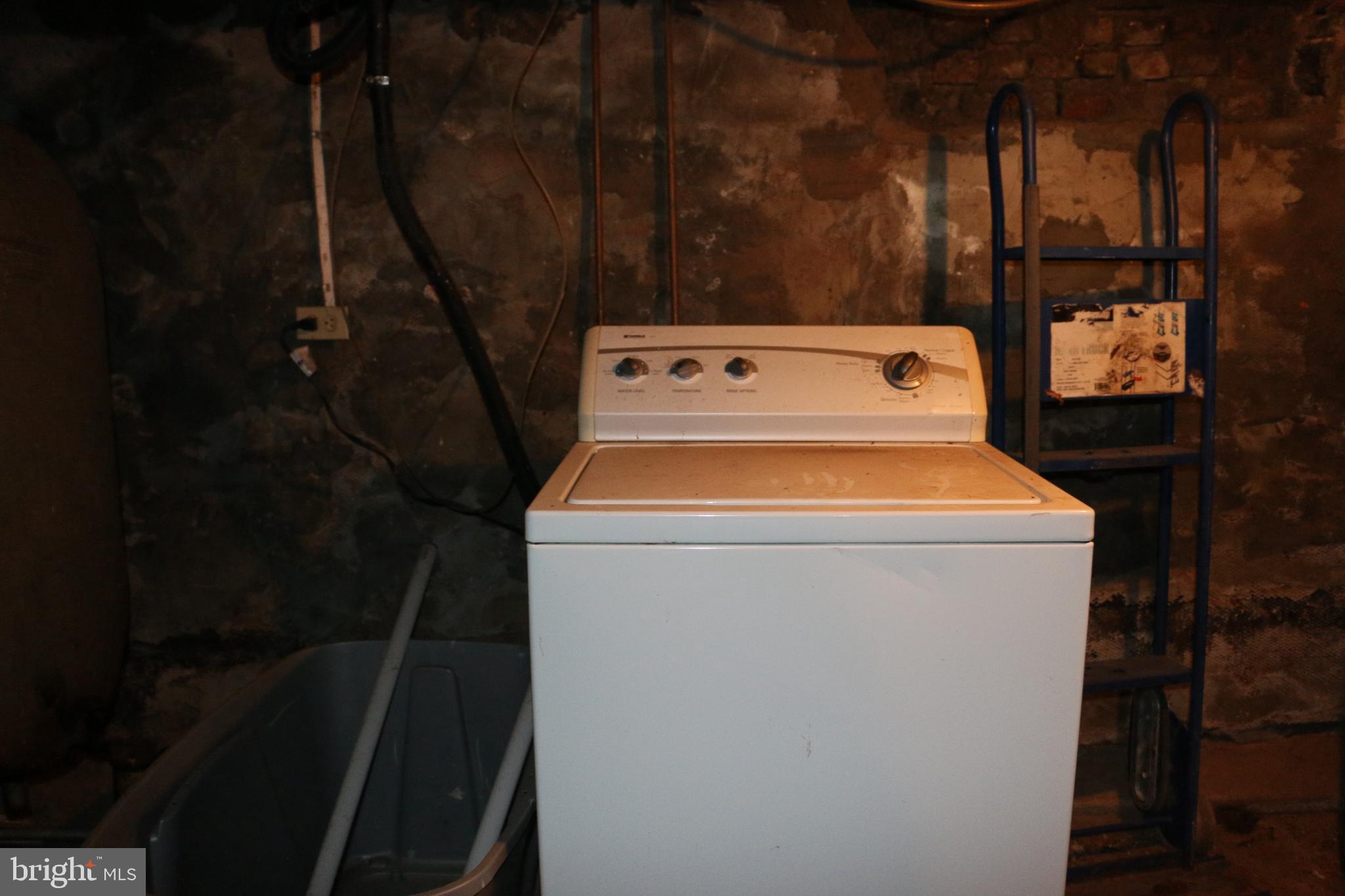9 North Front Street Darby, PA 19023 - Photo 17 of 19 a utility room with dryer and washer