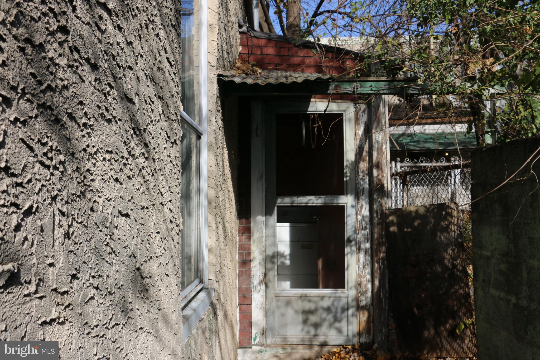 9 North Front Street Darby, PA 19023 - Photo 8 of 19 a close view of water heater room