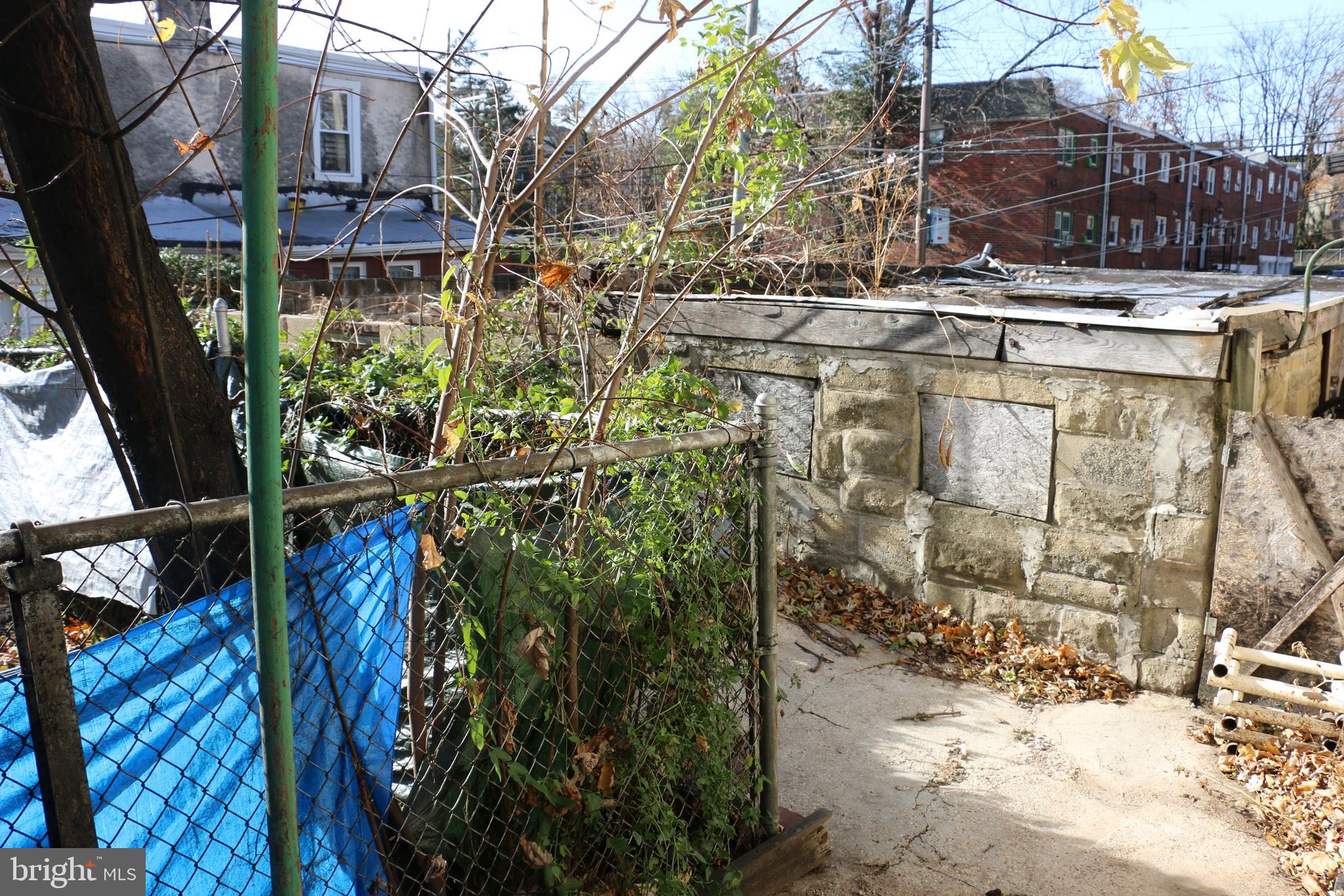9 North Front Street Darby, PA 19023 - Photo 9 of 19 a view of a house with a tree