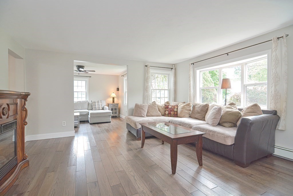 93 Cameron Road Norwood, MA 02062 - Photo 13 of 42 a living room with furniture and a large window