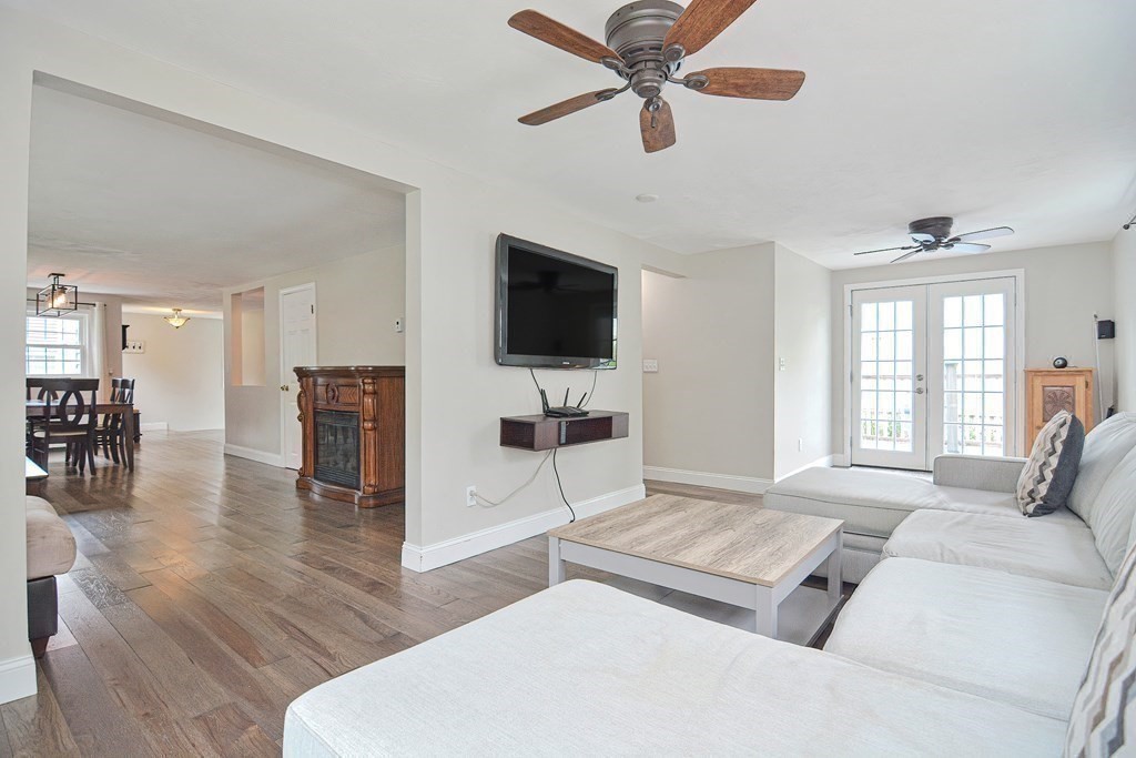 93 Cameron Road Norwood, MA 02062 - Photo 14 of 42 a living room with furniture and a flat screen tv