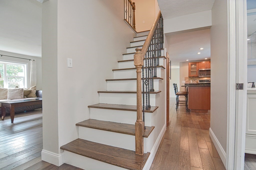 93 Cameron Road Norwood, MA 02062 - Photo 19 of 42 a view of entryway and hall with wooden floor