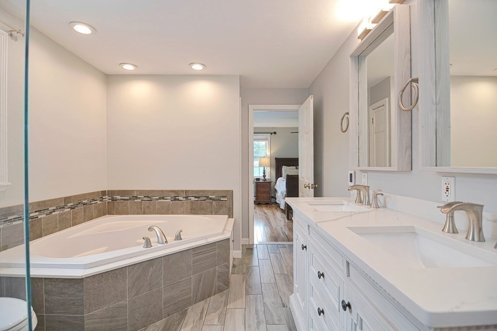 93 Cameron Road Norwood, MA 02062 - Photo 23 of 42 a bathroom with a bathtub and a sink