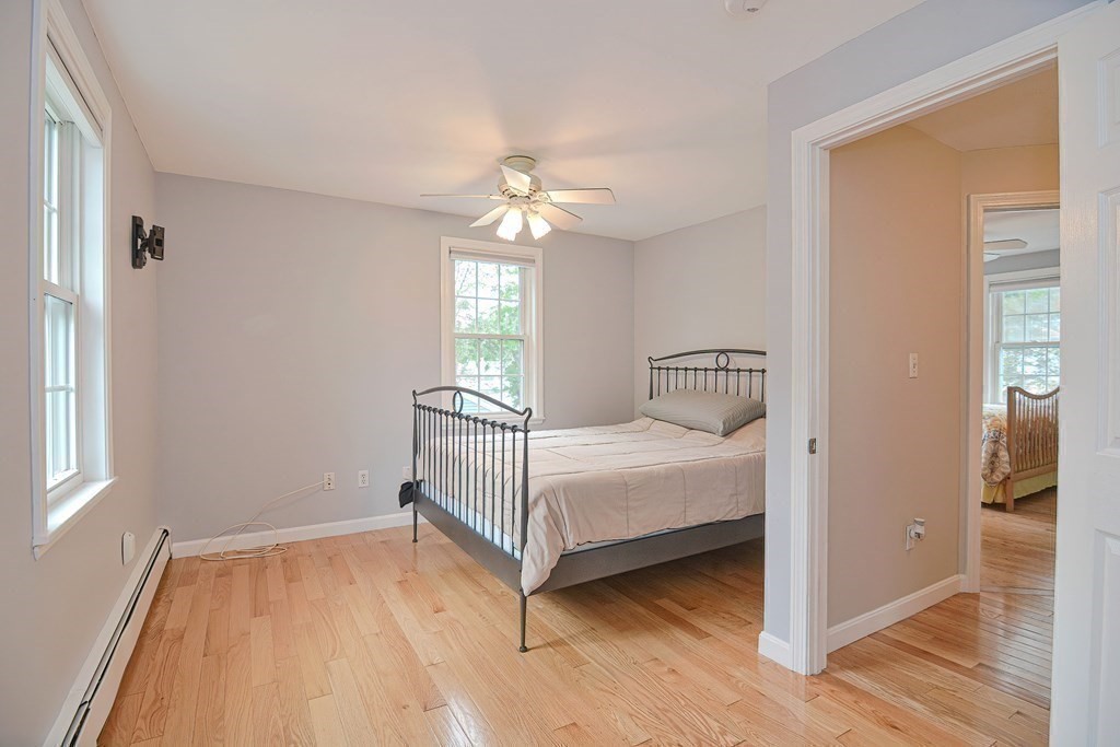 93 Cameron Road Norwood, MA 02062 - Photo 27 of 42 a bedroom with a bed and window